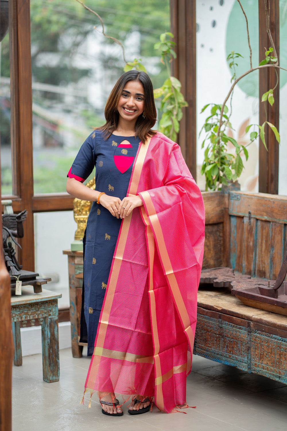 Dark Blue Raw Silk Kurti with Golden Elephant & Horse motifs Paired with Rani Pink Zari Checks Dupatta(Neck & sleeve patched with Rani pink Silk fabric)