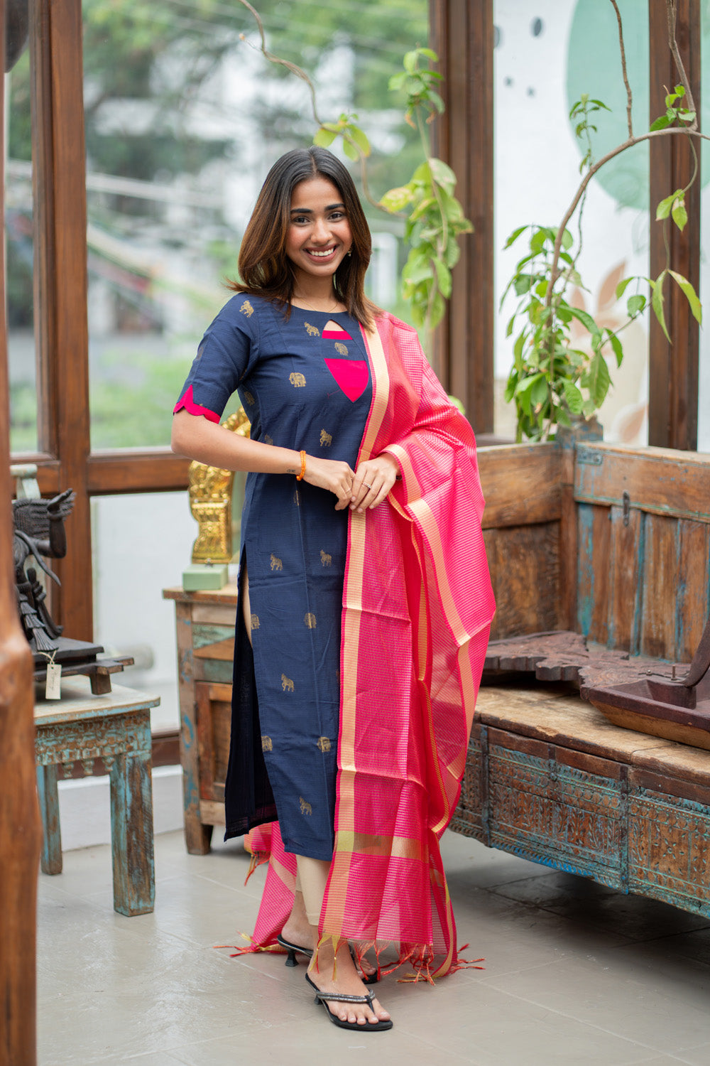 Dark Blue Raw Silk Kurti with Golden Elephant & Horse motifs Paired with Rani Pink Zari Checks Dupatta(Neck & sleeve patched with Rani pink Silk fabric)