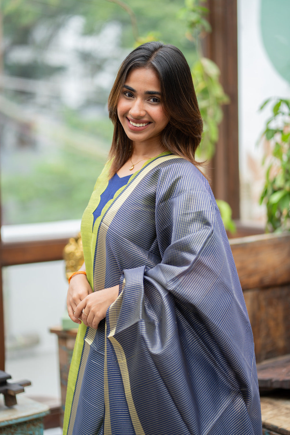 Parrot Green Raw Silk Kurti & Pant with Golden Floral Motifs Paired with Blue Zari Checks Dupatta(Neck & Sleeve patched with Blue semi raw Silk Fabric)