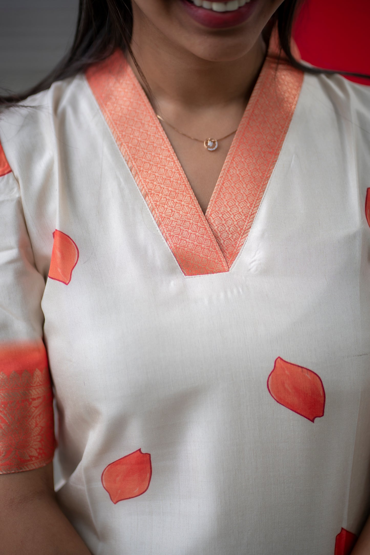 AA080 White with Orange Combo Silk floral kurti