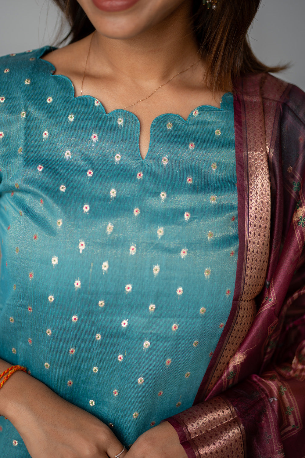Blue Raw Silk Kurti with Beautiful Motifs paired with Organza Dupatta