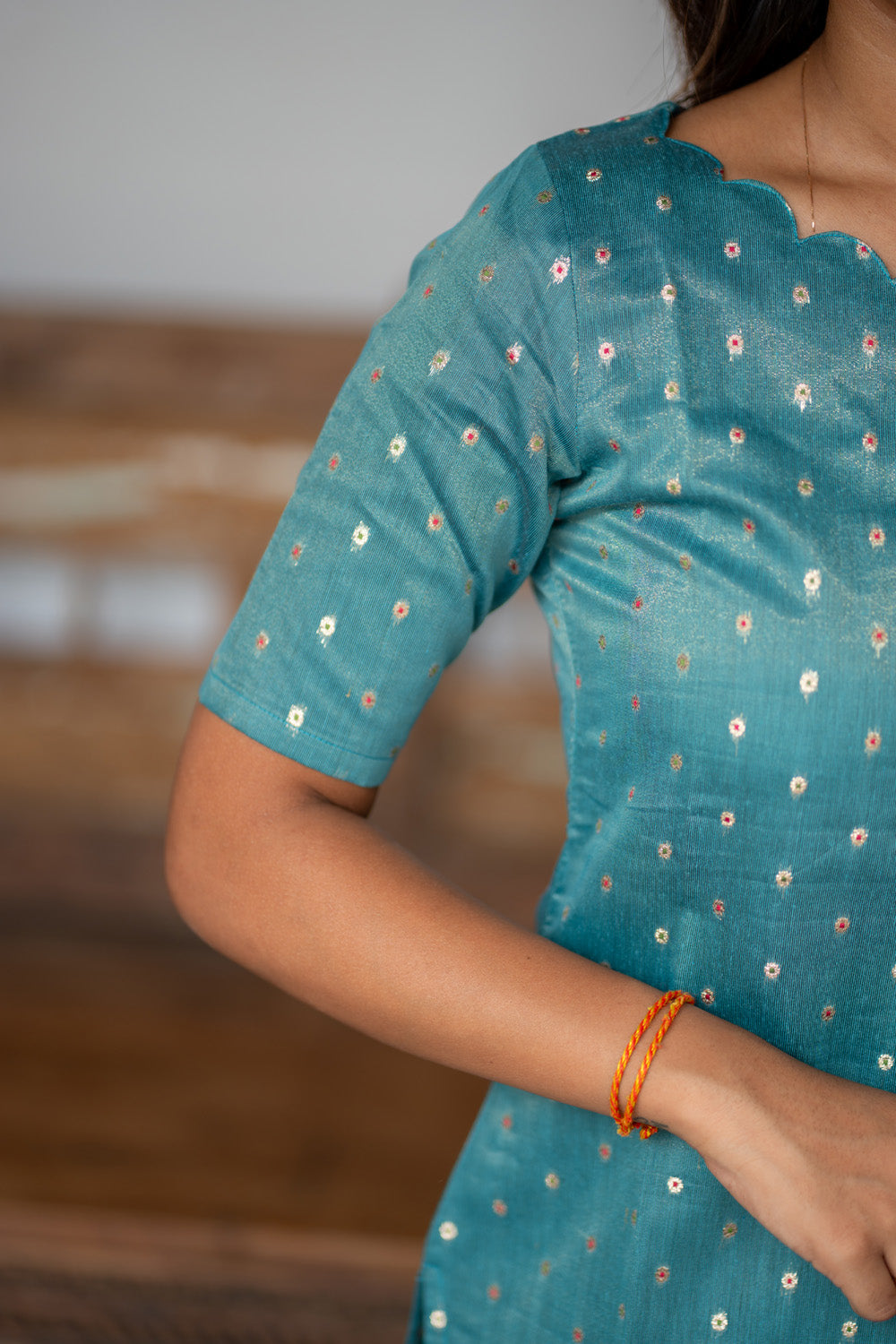 Blue Raw Silk Kurti with Beautiful Motifs paired with Organza Dupatta