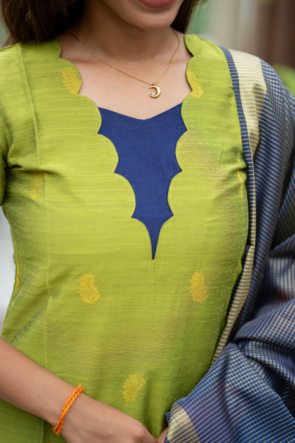 Parrot Green Raw Silk Kurti & Pant with Golden Floral Motifs Paired with Blue Zari Checks Dupatta(Neck & Sleeve patched with Blue semi raw Silk Fabric)