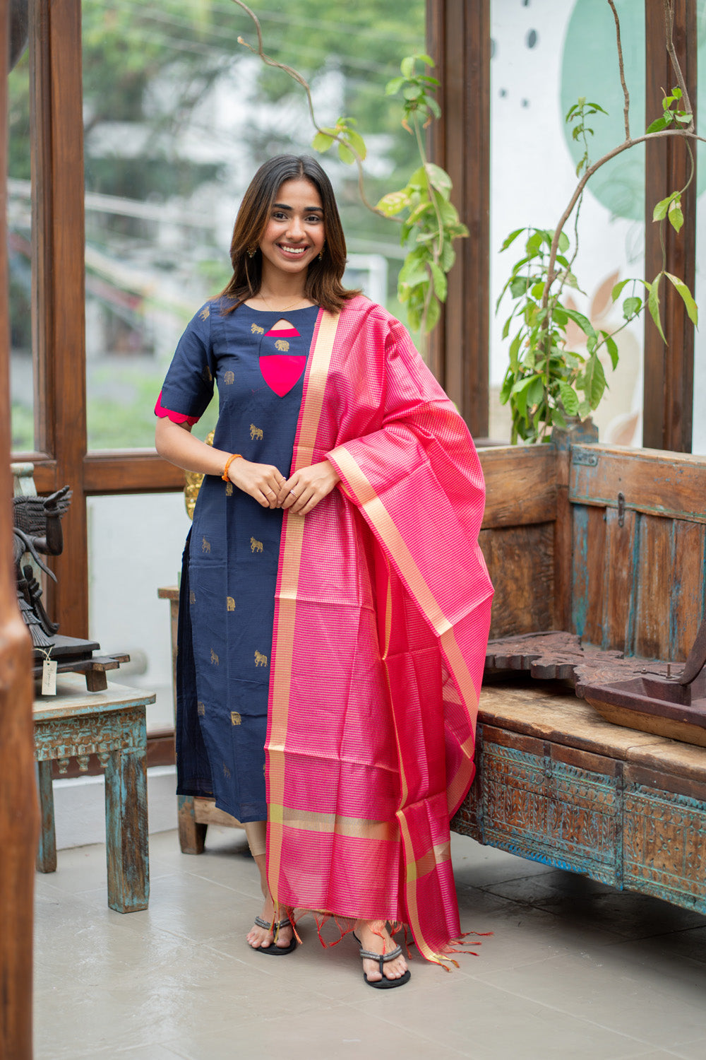 Dark Blue Raw Silk Kurti with Golden Elephant & Horse motifs Paired with Rani Pink Zari Checks Dupatta(Neck & sleeve patched with Rani pink Silk fabric)